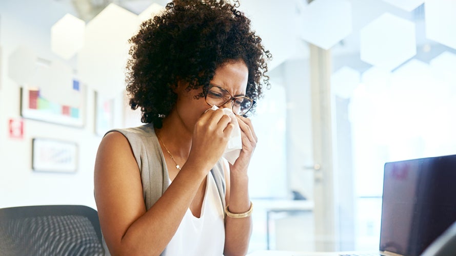 Person blowing their nose