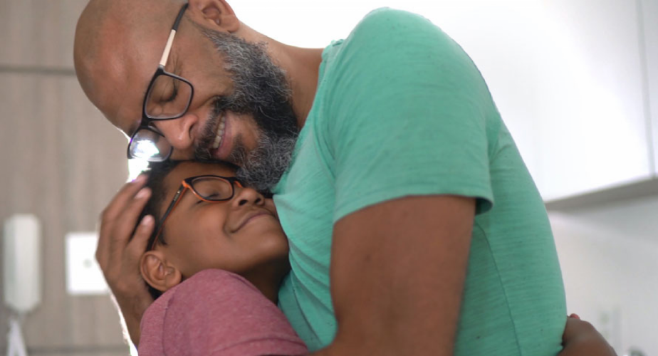 Man hugging his child