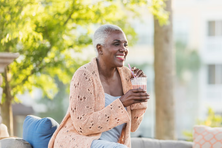 Person drinking through a straw