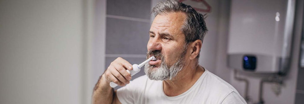Man brushing teeth