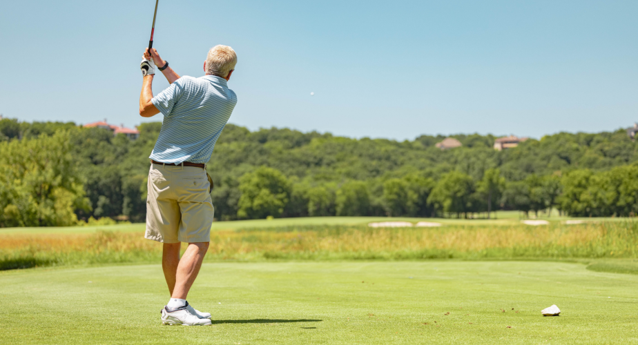Person golfing