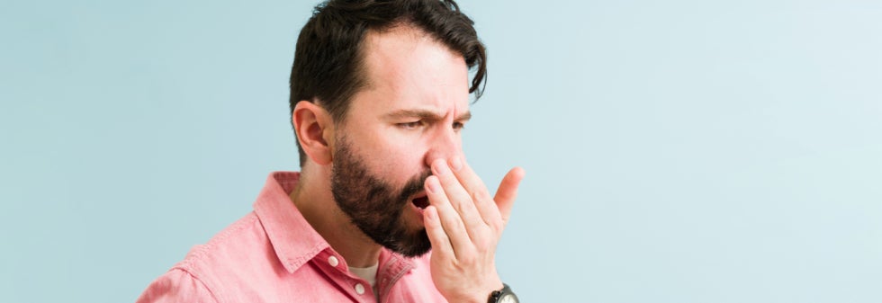 Man testing breath
