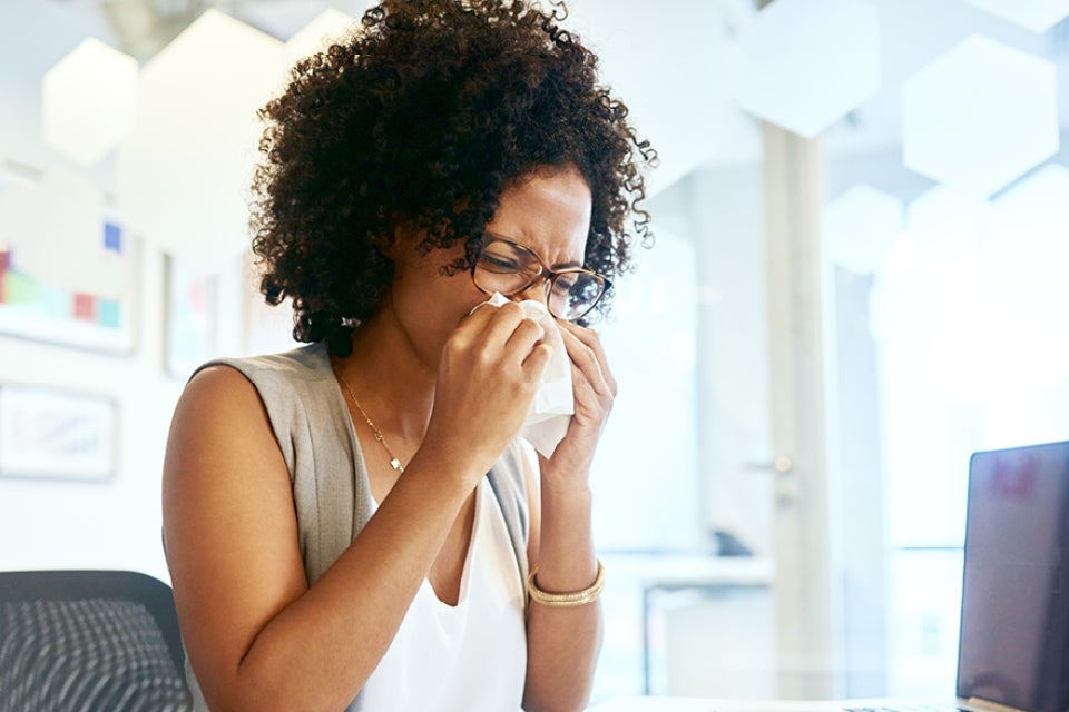 Person blowing their nose