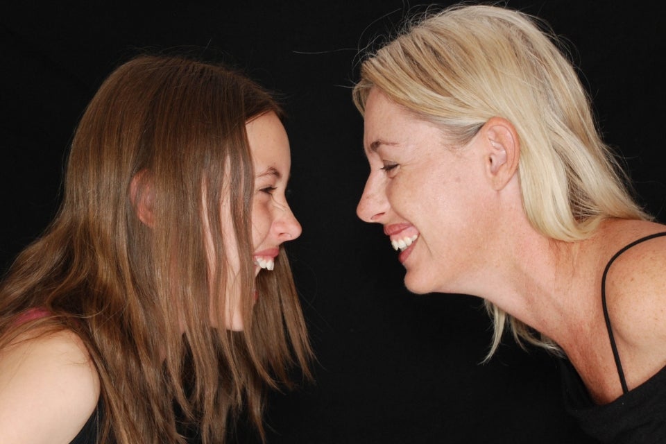 Two people laughing