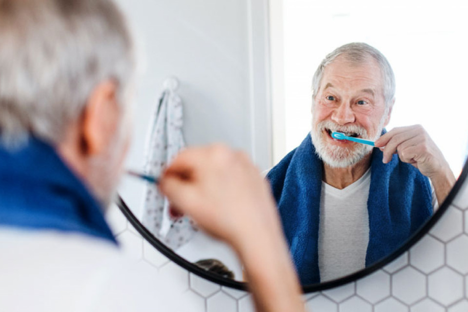 Person brushing teeth