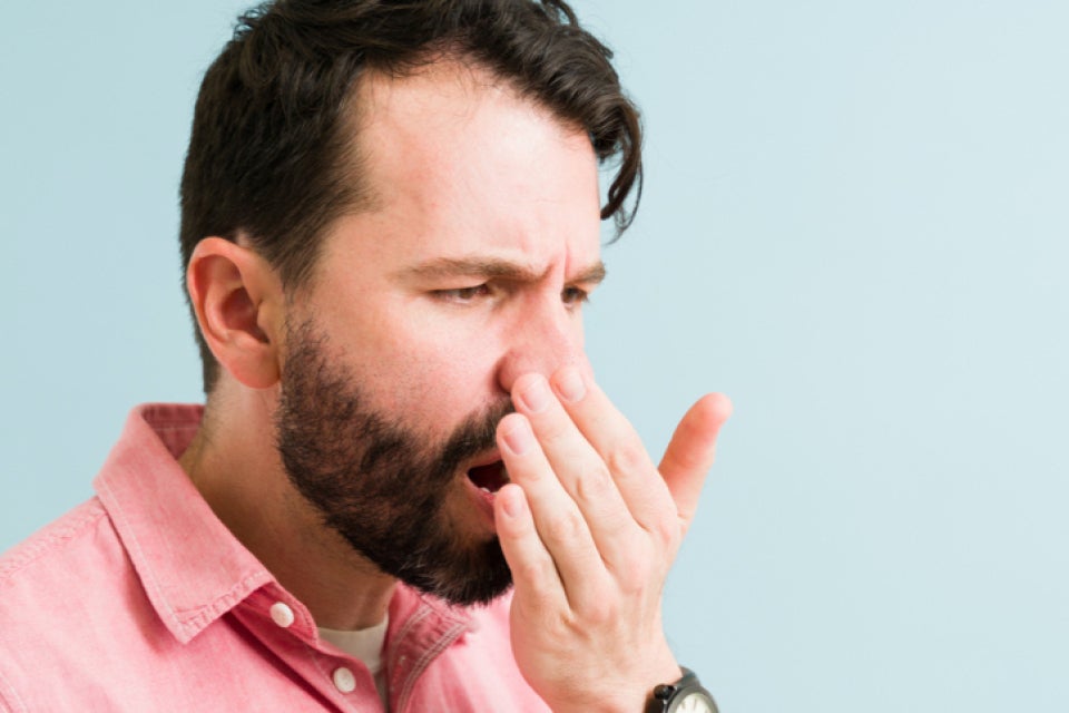 Man testing breath